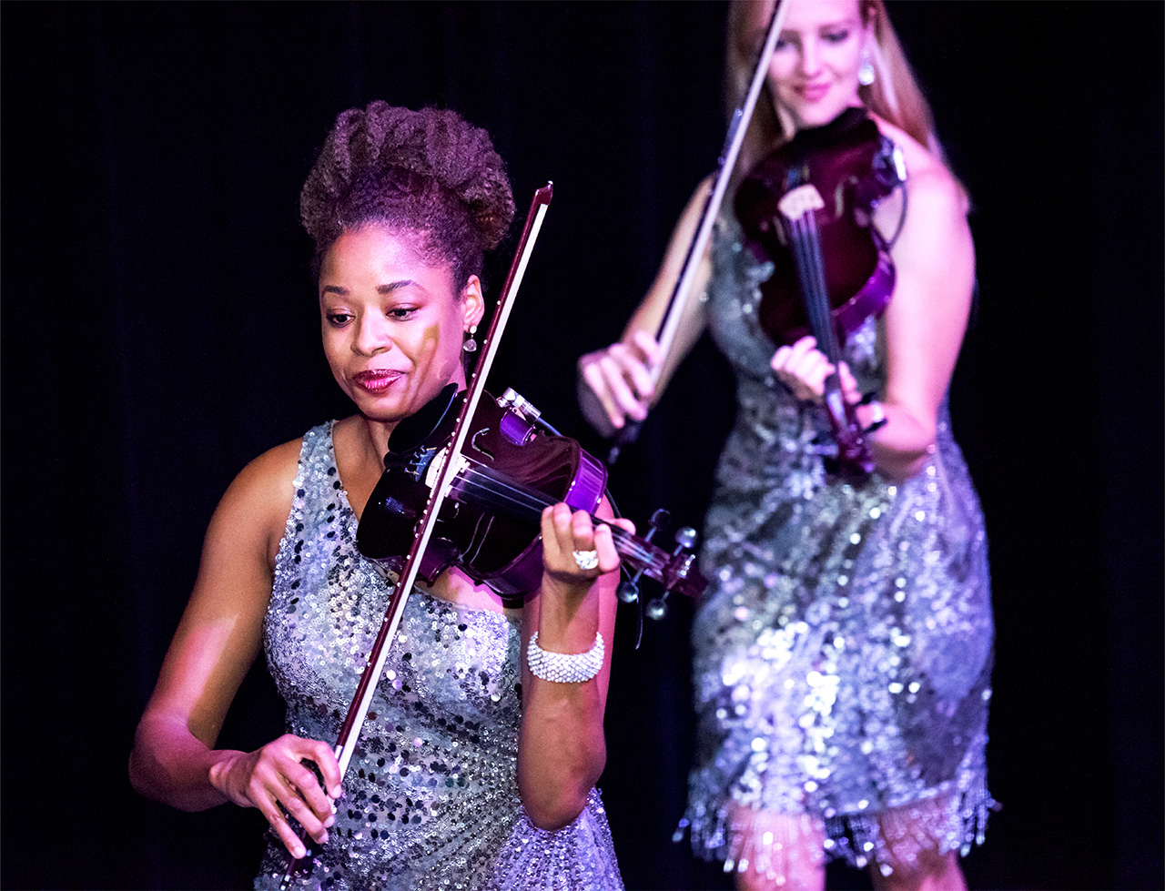 Two violinists doing an opening performance at a Gala dinner